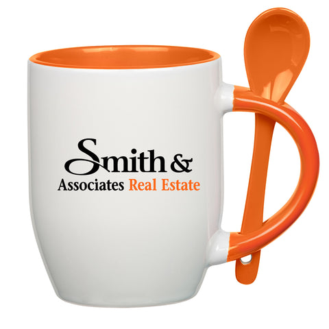 White coffee mug with orange spoon
